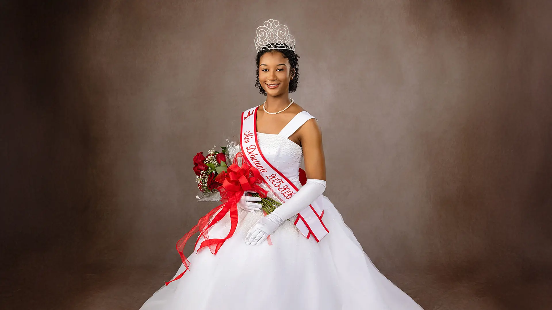 Allow us, along with presenting sponsor The Figgers Foundation, to proudly present the official portrait of our 2026 Miss Debutante, Aaryn Watson! Aaryn is the daughter of Mr. and Mrs. Darrick and Allyson Watson. A senior at Florida State University Schools, she is ranked in the top 7% of her class and has earned an outstanding 4.43 GPA.